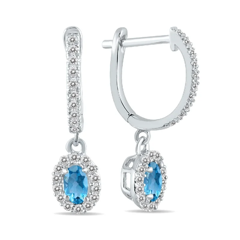 Marquee 1/2 Carat Oval Blue Topaz and Diamond Halo Dangle Earrings in 10K White Gold