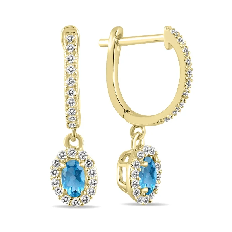 Marquee 1/2 Carat Oval Blue Topaz and Diamond Halo Dangle Earrings in 10K Yellow Gold