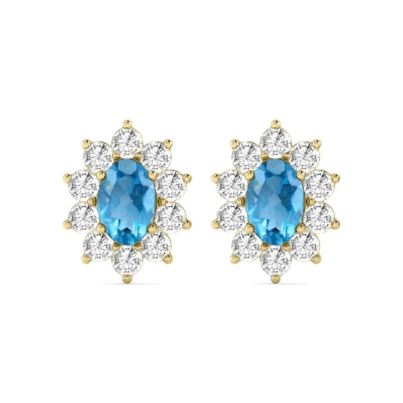 Marquee Oval Shape Blue Topaz and Diamond Flower Earrings in 14K Yellow Gold